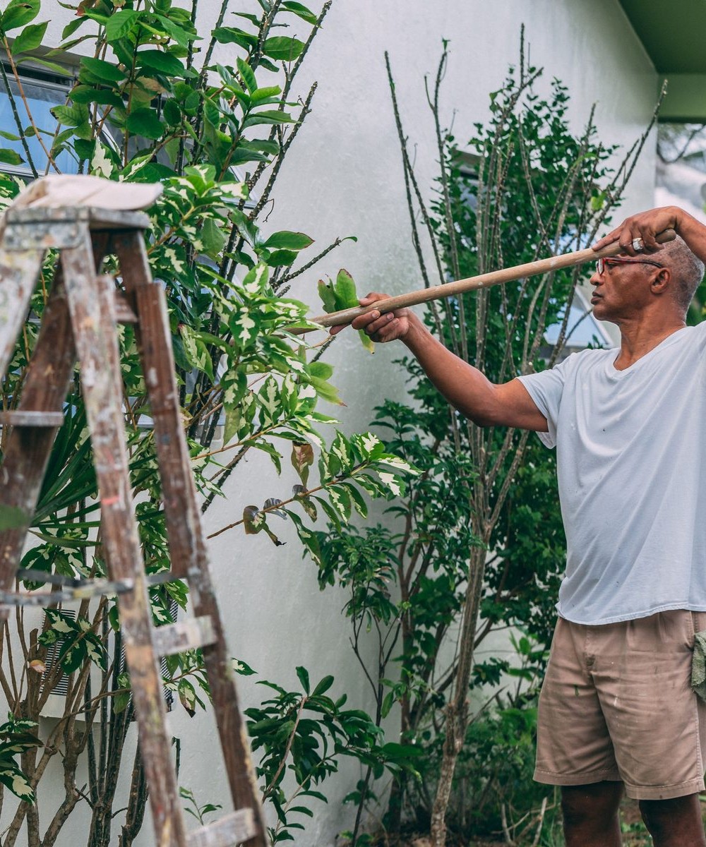 Residential exterior painting work on a home wall